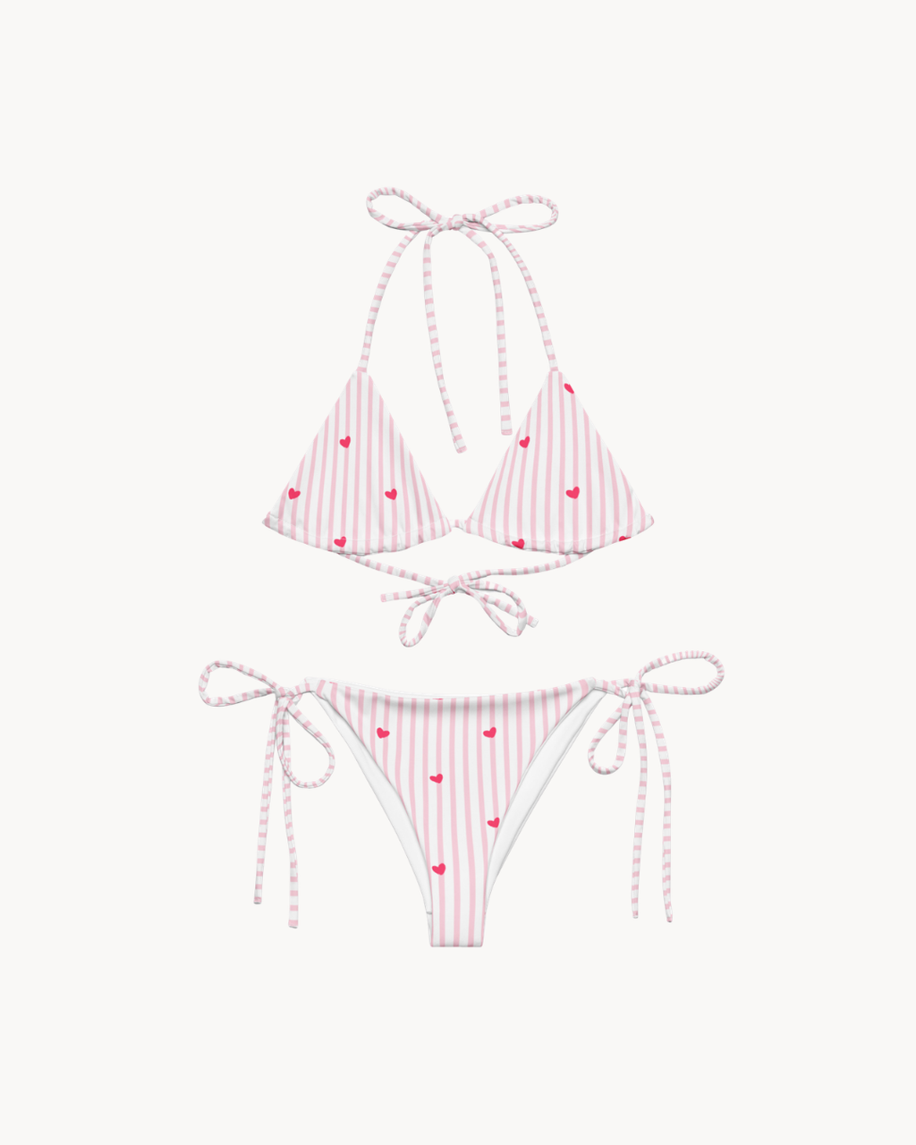 Striped heart all-over print recycled string bikini with adjustable tie straps on a clean background