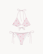 Striped heart all-over print recycled string bikini with adjustable tie straps on a clean background