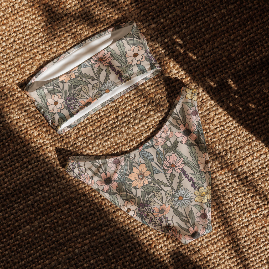 Vintage wildflower print recycled bandeau bikini top and bottoms with soft floral design on neutral background