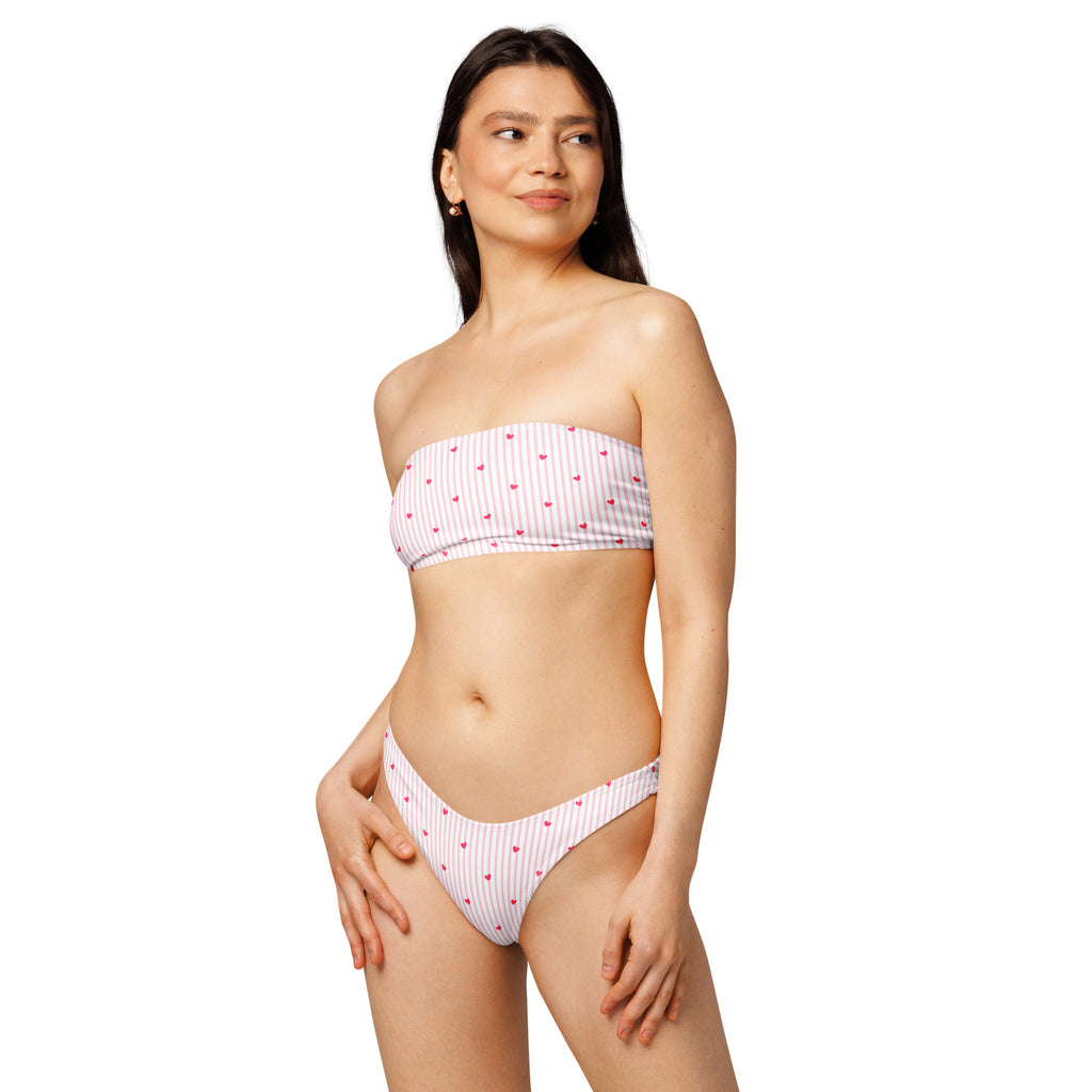 Striped heart print recycled bandeau bikini top and high-leg bottoms on a neutral background