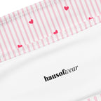 Striped heart print recycled bandeau bikini top and high-leg bottoms on a neutral background