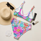 Abstract preppy print high-waisted bikini set with removable padding on a light background