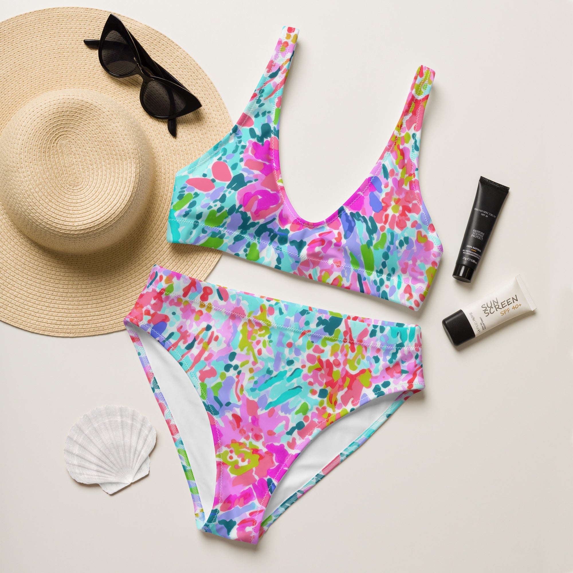 Abstract preppy print high-waisted bikini set with removable padding on a light background