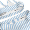 Blue and white striped recycled high-waisted bikini set with removable padding on a light background