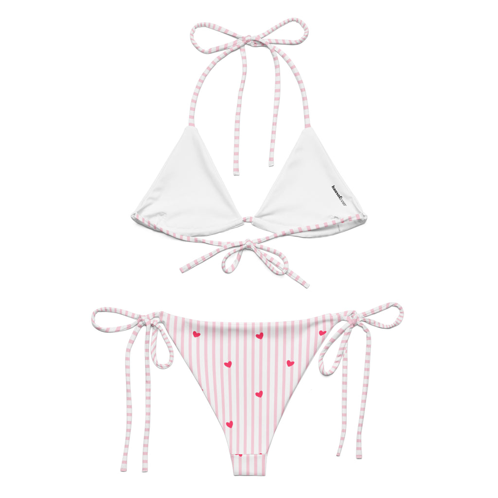 Striped heart all-over print recycled string bikini with adjustable tie straps on a clean background