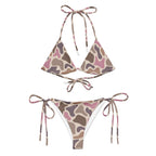 Pink old school camo all-over print recycled string bikini with tie straps on a clean white background