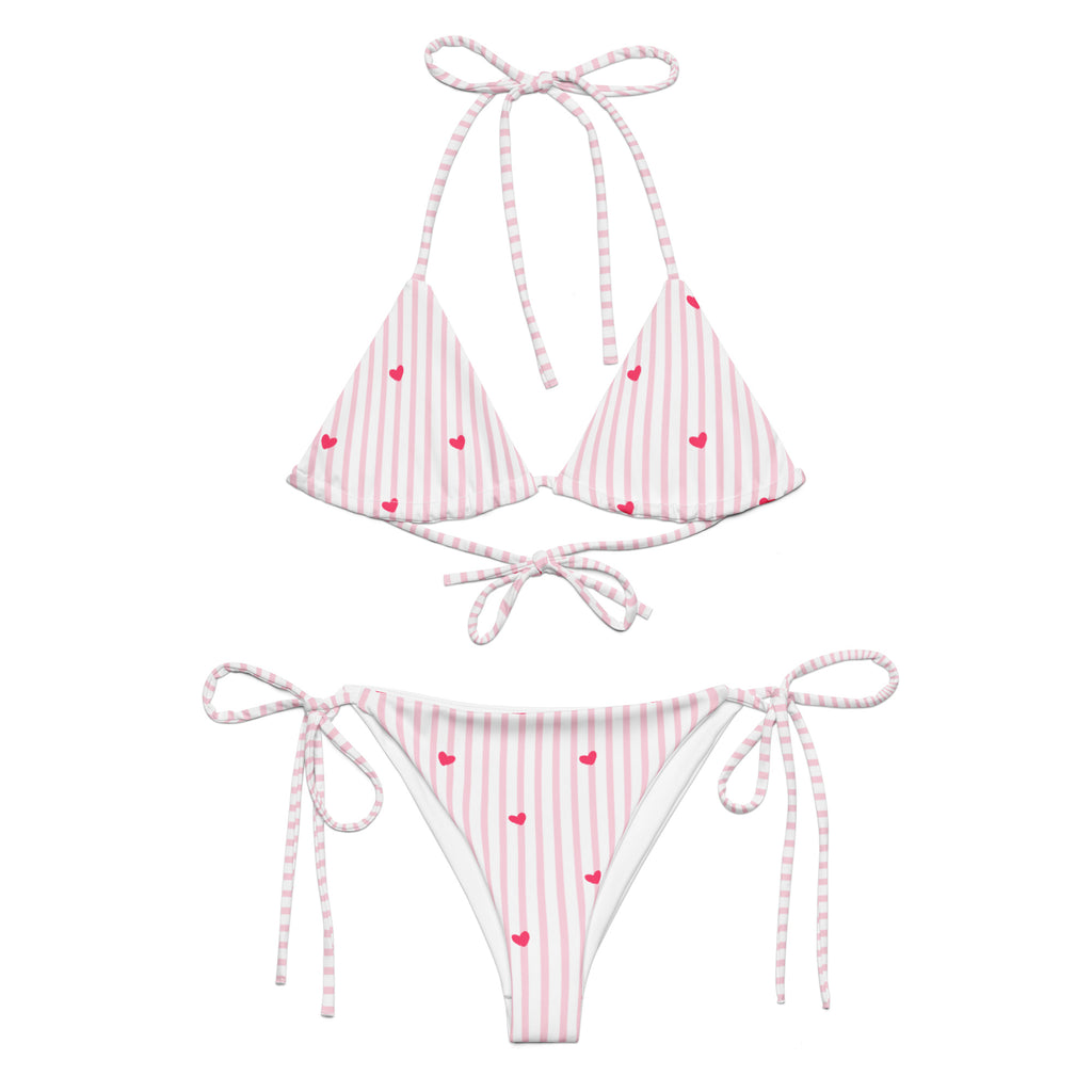 Striped heart all-over print recycled string bikini with adjustable tie straps on a clean background