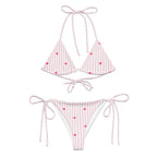 Striped heart all-over print recycled string bikini with adjustable tie straps on a clean background