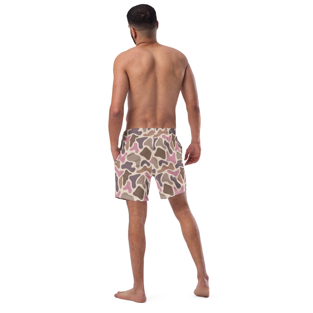 Pink old school camouflage pattern recycled men's swim trunks on a white product background