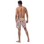 Pink old school camouflage pattern recycled men's swim trunks on a white product background
