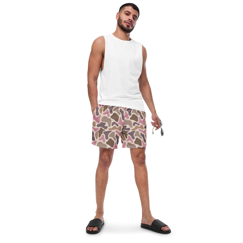 Pink old school camouflage pattern recycled men's swim trunks on a white product background