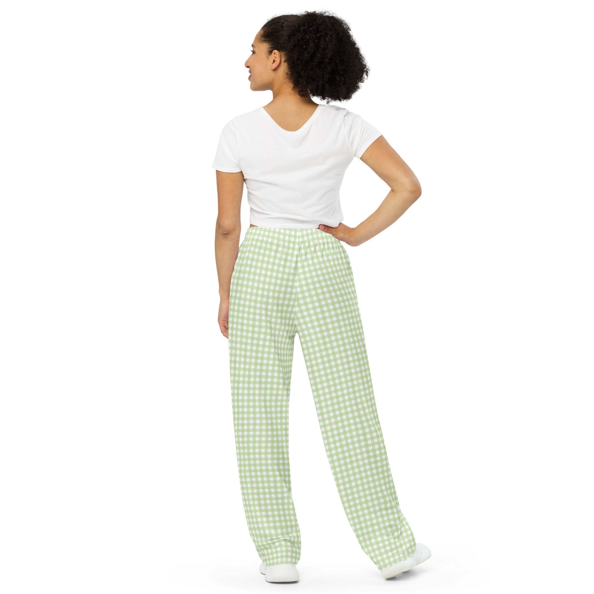 Green checker all-over print unisex wide-leg pants displayed in a product flat lay