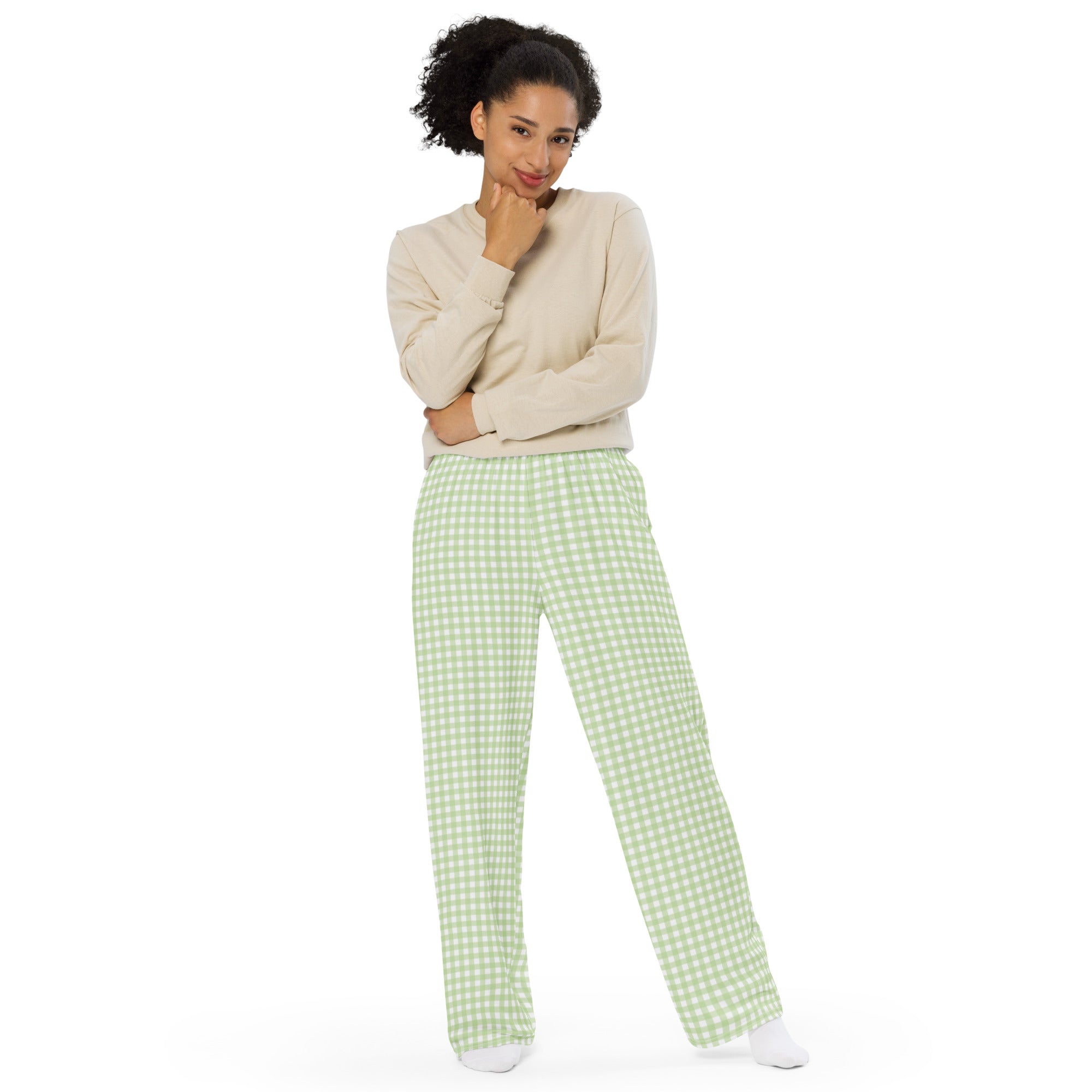 Green checker all-over print unisex wide-leg pants displayed in a product flat lay