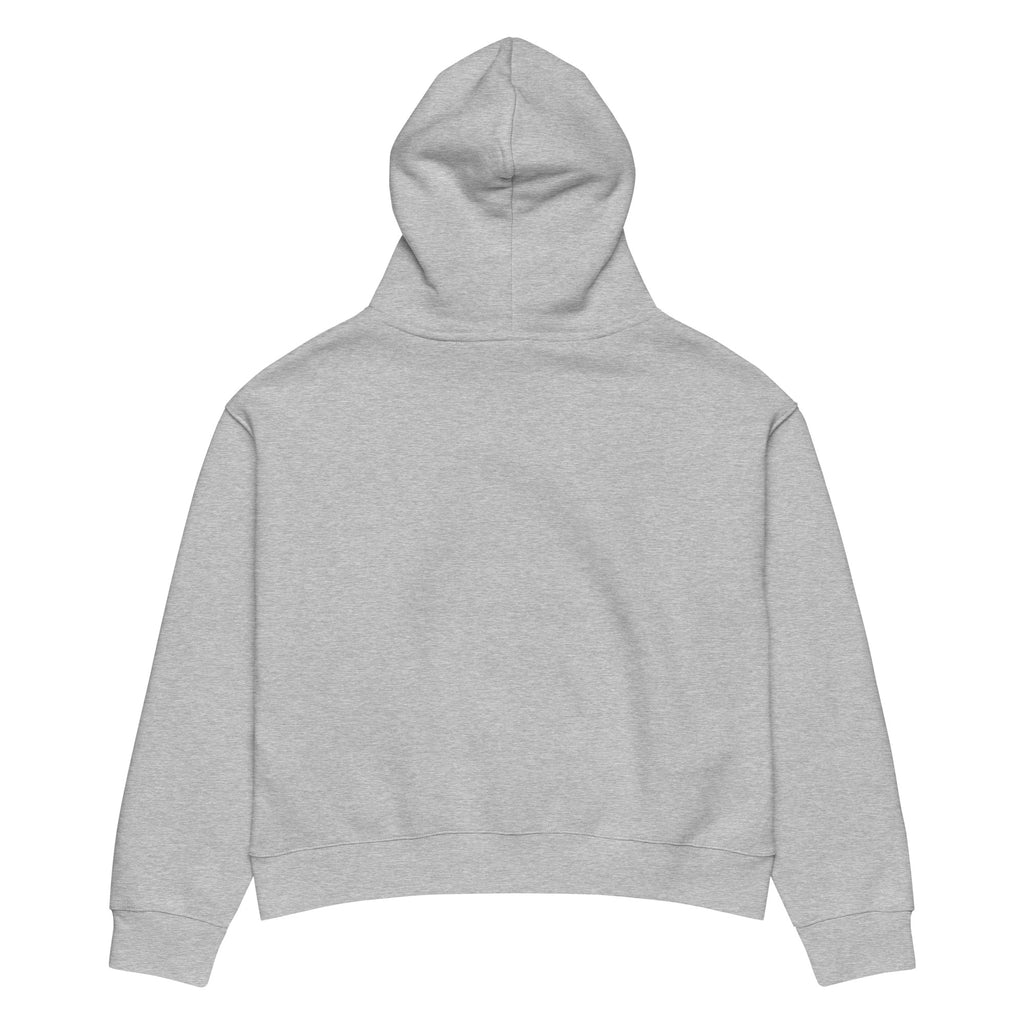 Women's relaxed fit hoodie displayed in a cozy flat lay on a neutral background