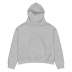 Women's relaxed fit hoodie displayed in a cozy flat lay on a neutral background