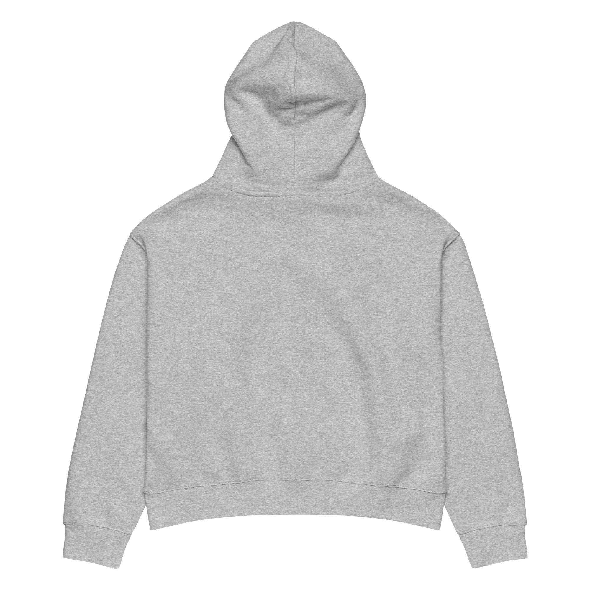 Women's relaxed fit hoodie displayed in a cozy flat lay on a neutral background