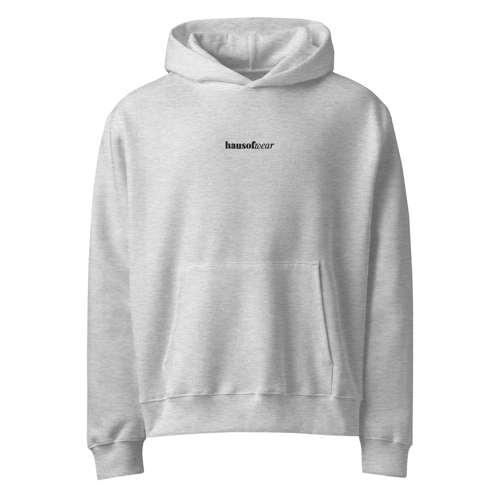 HausOfWear oversized heavyweight hoodie displayed in a relaxed flat lay on a neutral surface