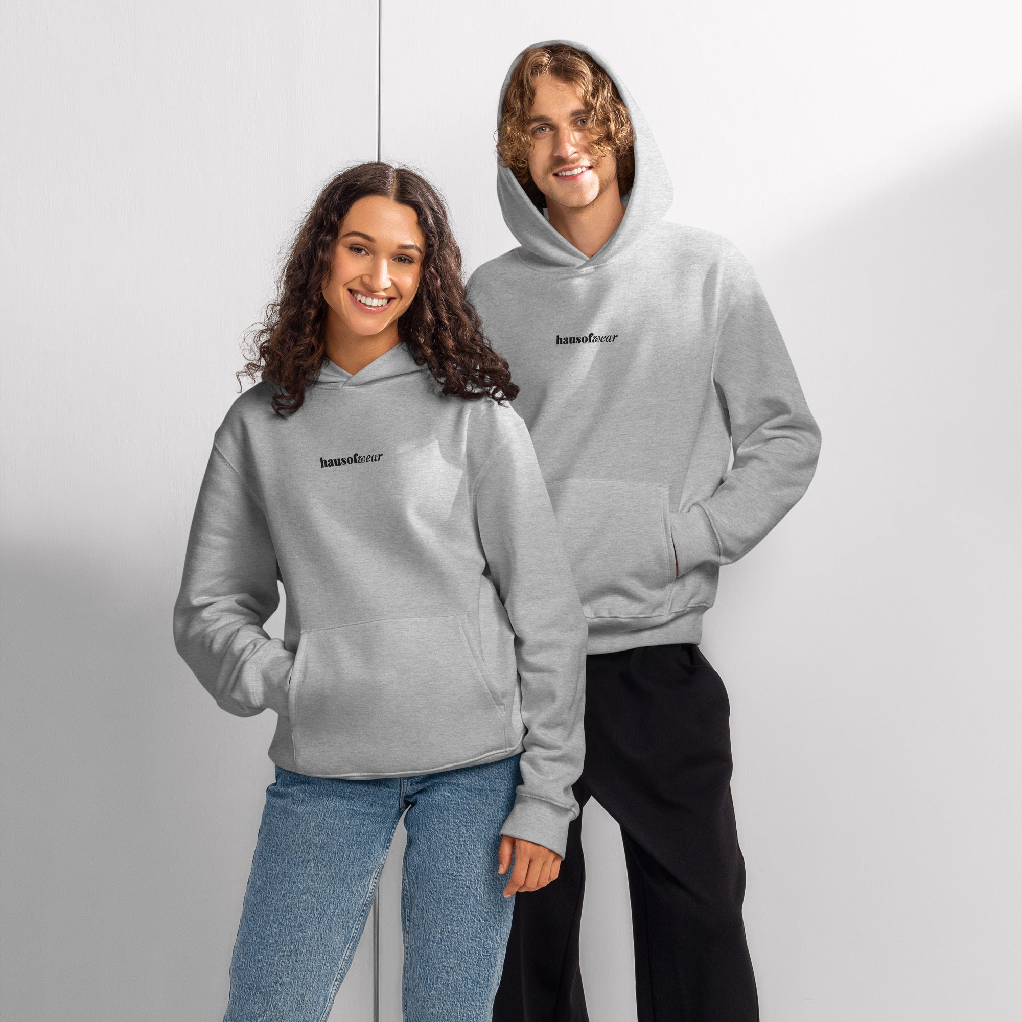 HausOfWear oversized heavyweight hoodie displayed in a relaxed flat lay on a neutral surface