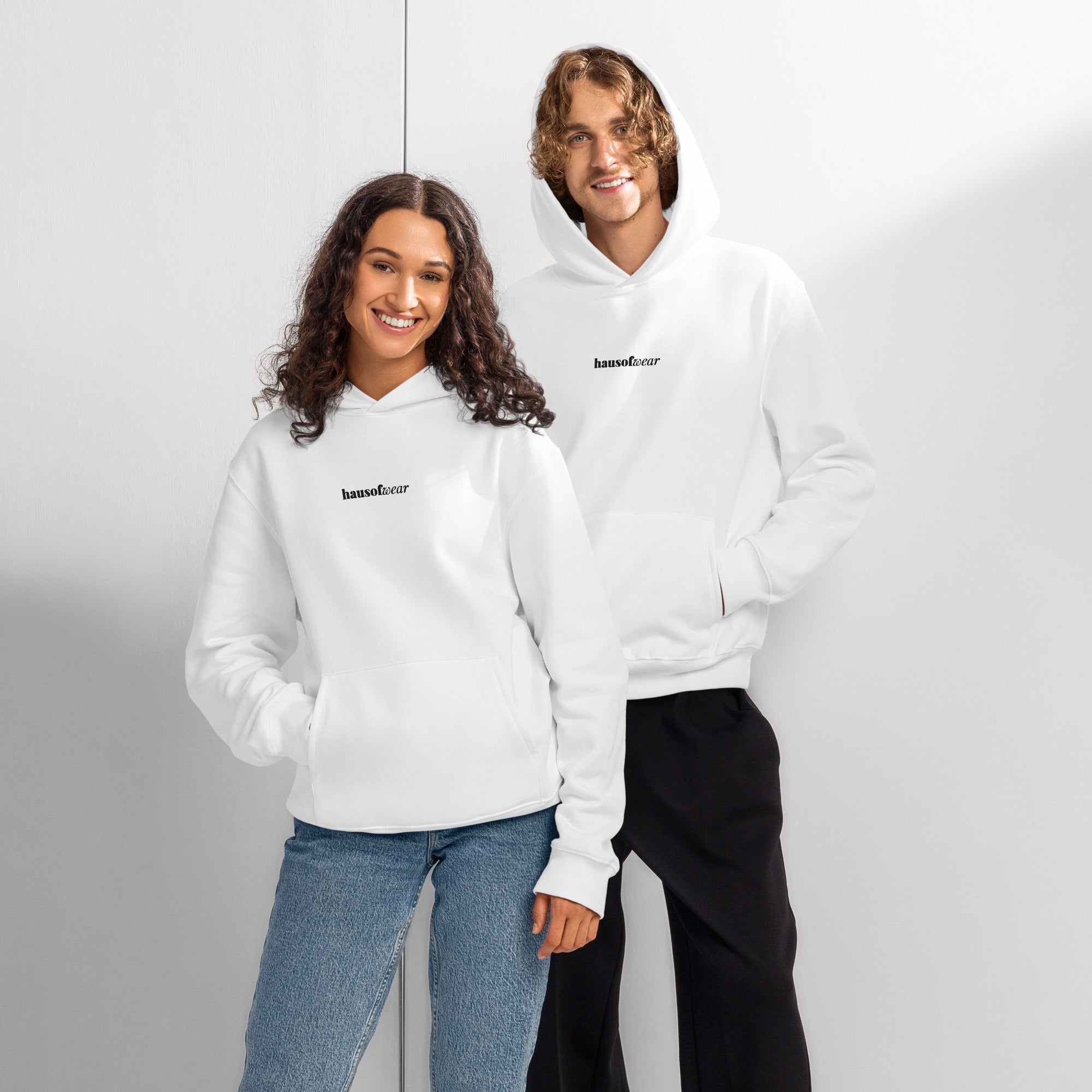 HausOfWear oversized heavyweight hoodie displayed in a relaxed flat lay on a neutral surface