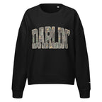 Darlin' script graphic women's organic crew neck sweatshirt in a cozy flat lay setup