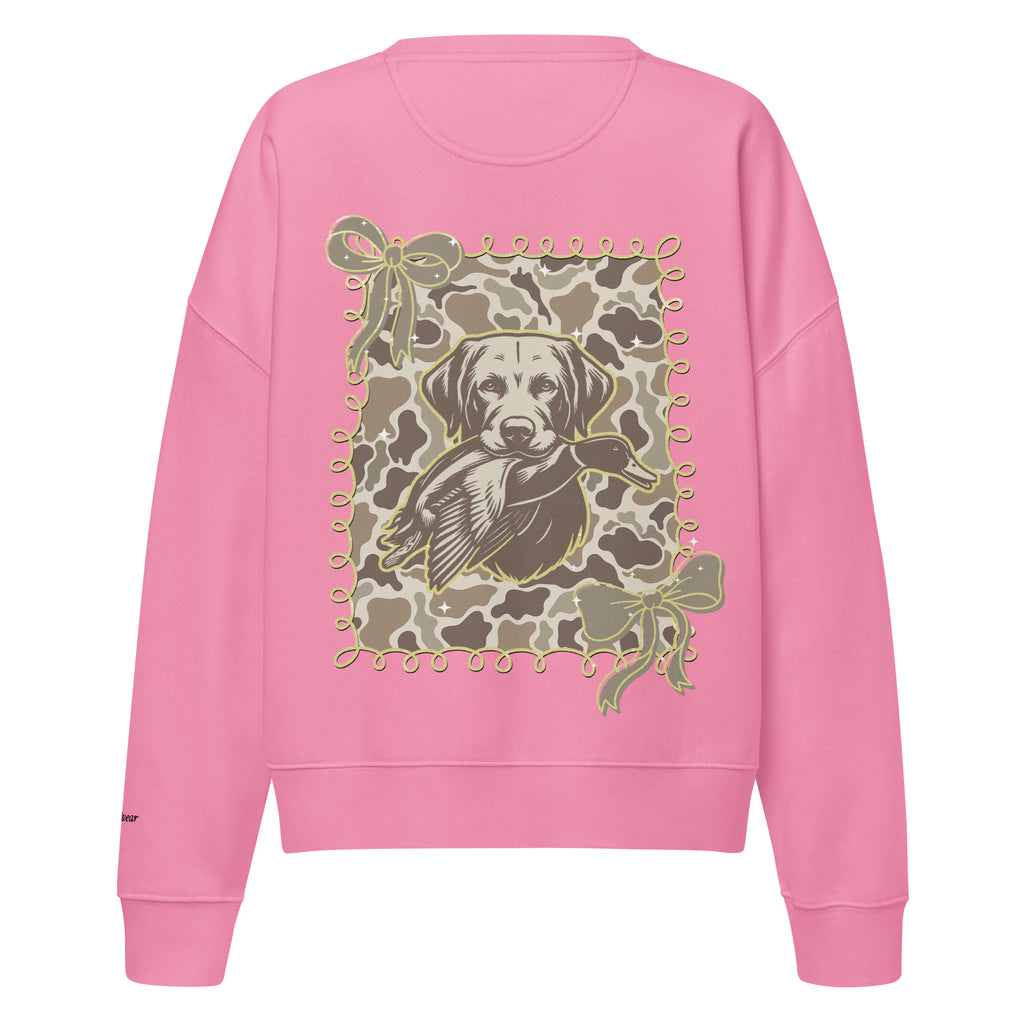 Camo hunting dog graphic women's organic crew neck sweatshirt displayed on a flat surface