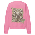 Camo hunting dog graphic women's organic crew neck sweatshirt displayed on a flat surface