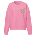 Camo hunting dog graphic women's organic crew neck sweatshirt displayed on a flat surface