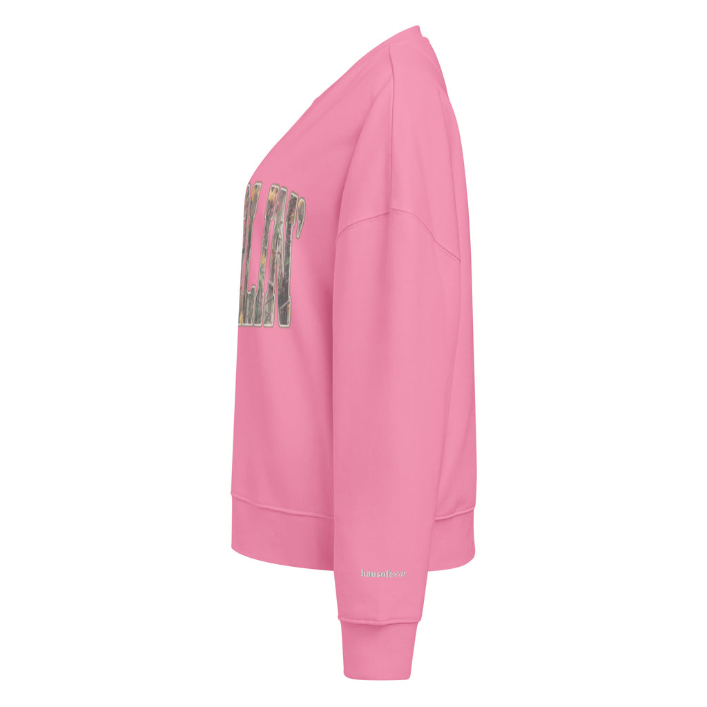 Darlin' script graphic women's organic crew neck sweatshirt in a cozy flat lay setup