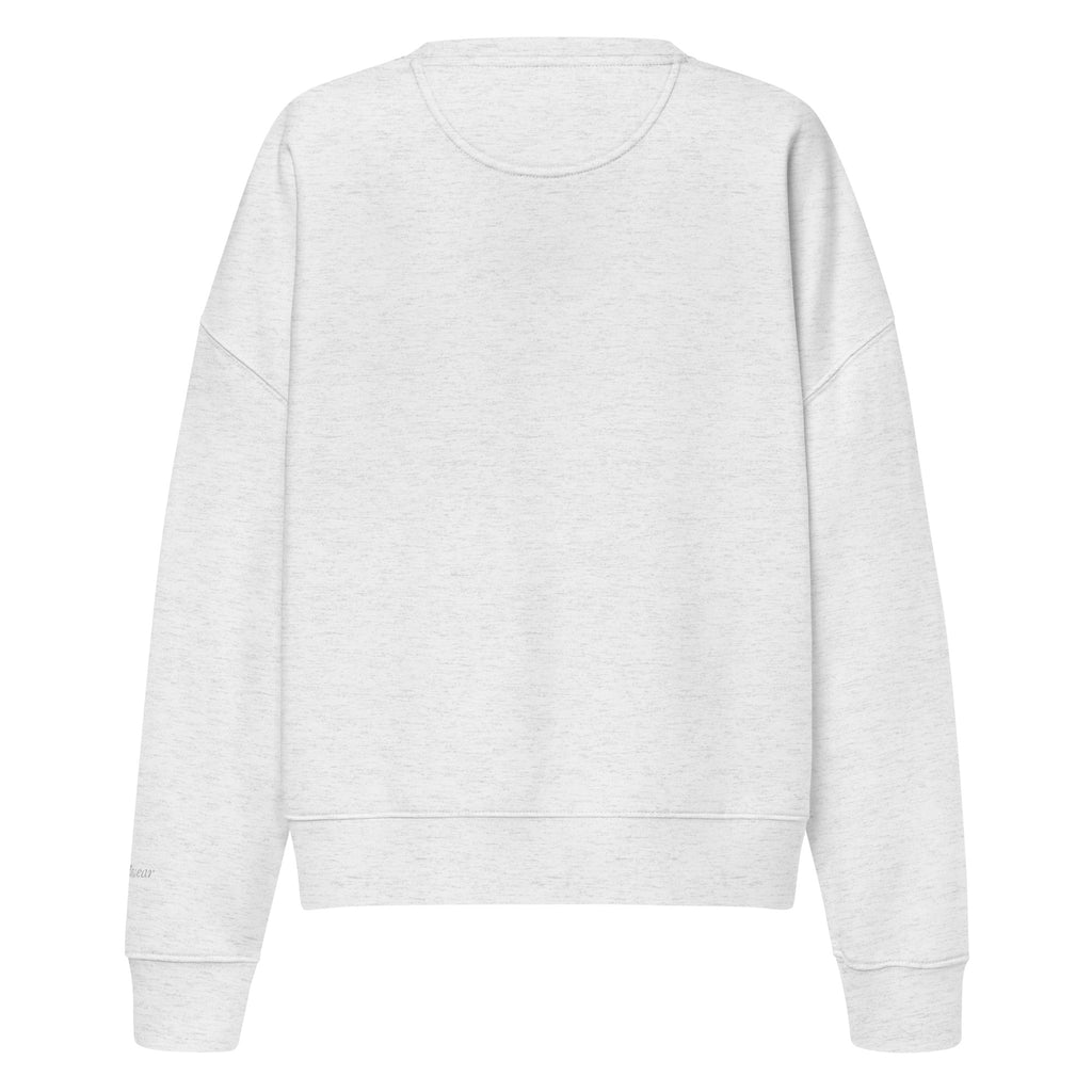 Darlin' script graphic women's organic crew neck sweatshirt in a cozy flat lay setup