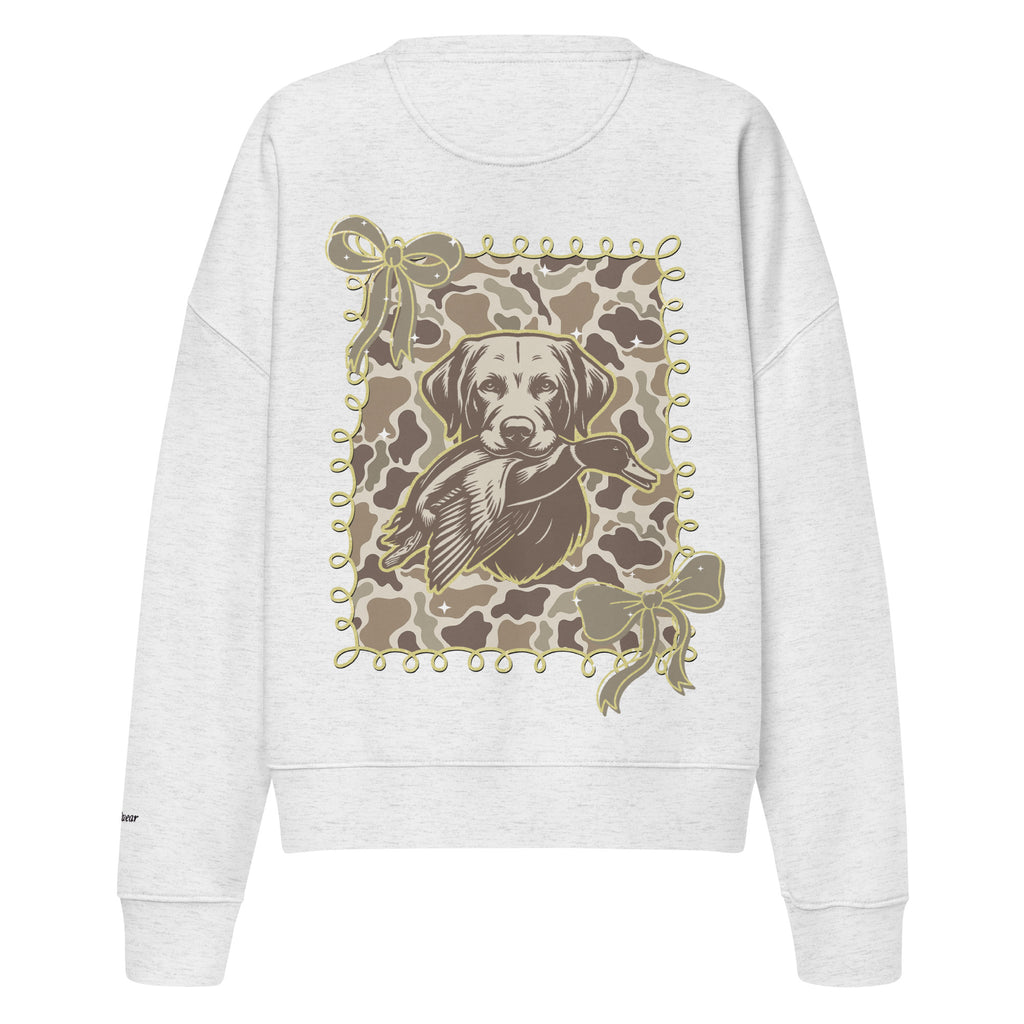 Camo hunting dog graphic women's organic crew neck sweatshirt displayed on a flat surface
