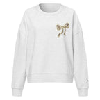 Camo hunting dog graphic women's organic crew neck sweatshirt displayed on a flat surface