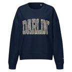 Darlin' script graphic women's organic crew neck sweatshirt in a cozy flat lay setup
