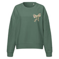 Camo hunting dog graphic women's organic crew neck sweatshirt displayed on a flat surface