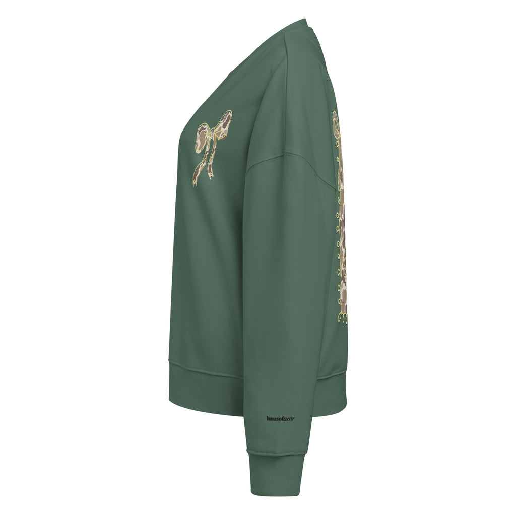Camo hunting dog graphic women's organic crew neck sweatshirt displayed on a flat surface