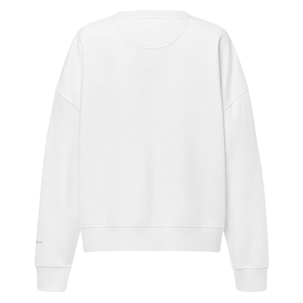 Darlin' script graphic women's organic crew neck sweatshirt in a cozy flat lay setup