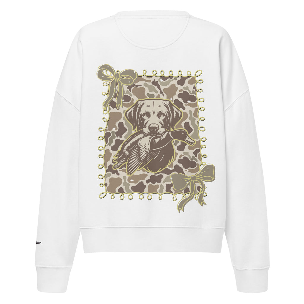 Camo hunting dog graphic women's organic crew neck sweatshirt displayed on a flat surface