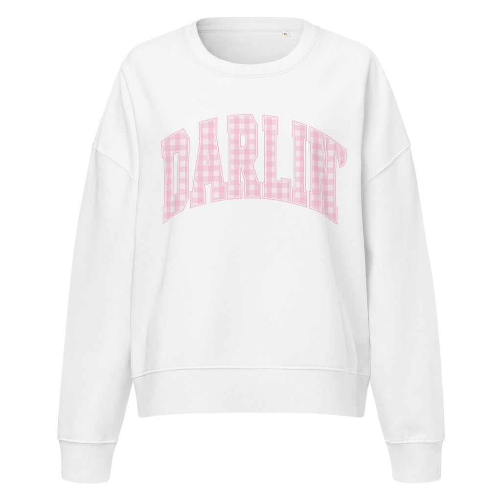 Pink Darlin' women's organic crew neck sweatshirt with southern script graphic on a flat lay